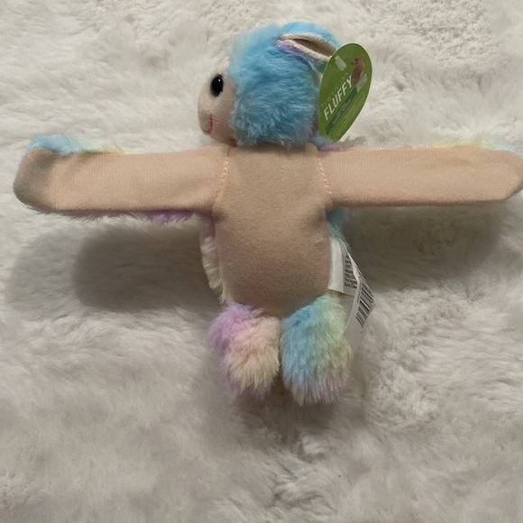 Happy go fluffy plush wrist wrap - Picture 2 of 3
